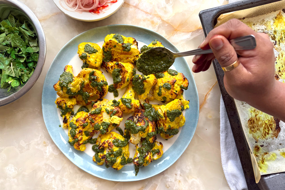 Turmeric-yoghurt cauliflower with mint and cardamom