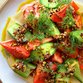 Tomato and cucumber salad with tahini and spicy dukkah oil