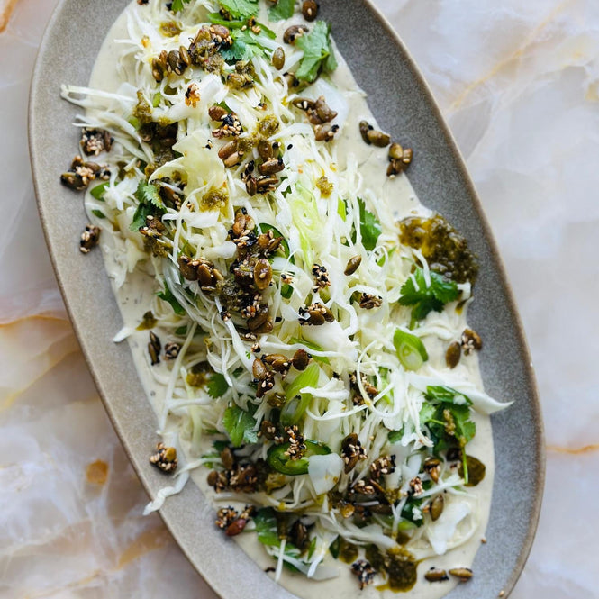 Green harissa and tahini slaw with pumpkin seed brittle